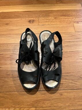 Fly London Black Lace-Up Cutout Leather Slingback Sandals